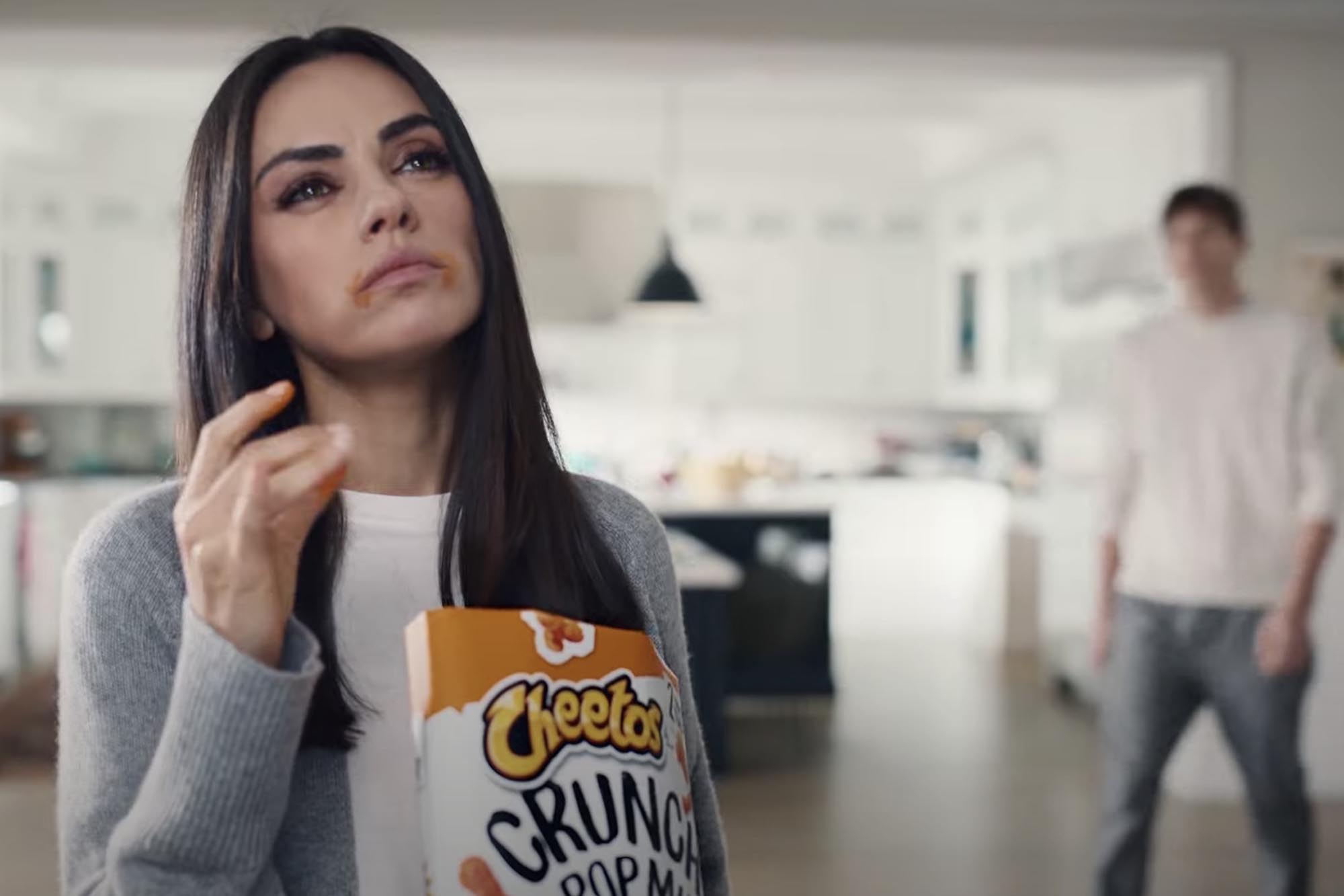 Mila Kunis swears "It Wasn't Me" as she cheats husband Ashton Kutcher out of his Cheetos Crunch Pop Mix in hilarious Super Bowl LV ad, featuring reggae singer Shaggy.