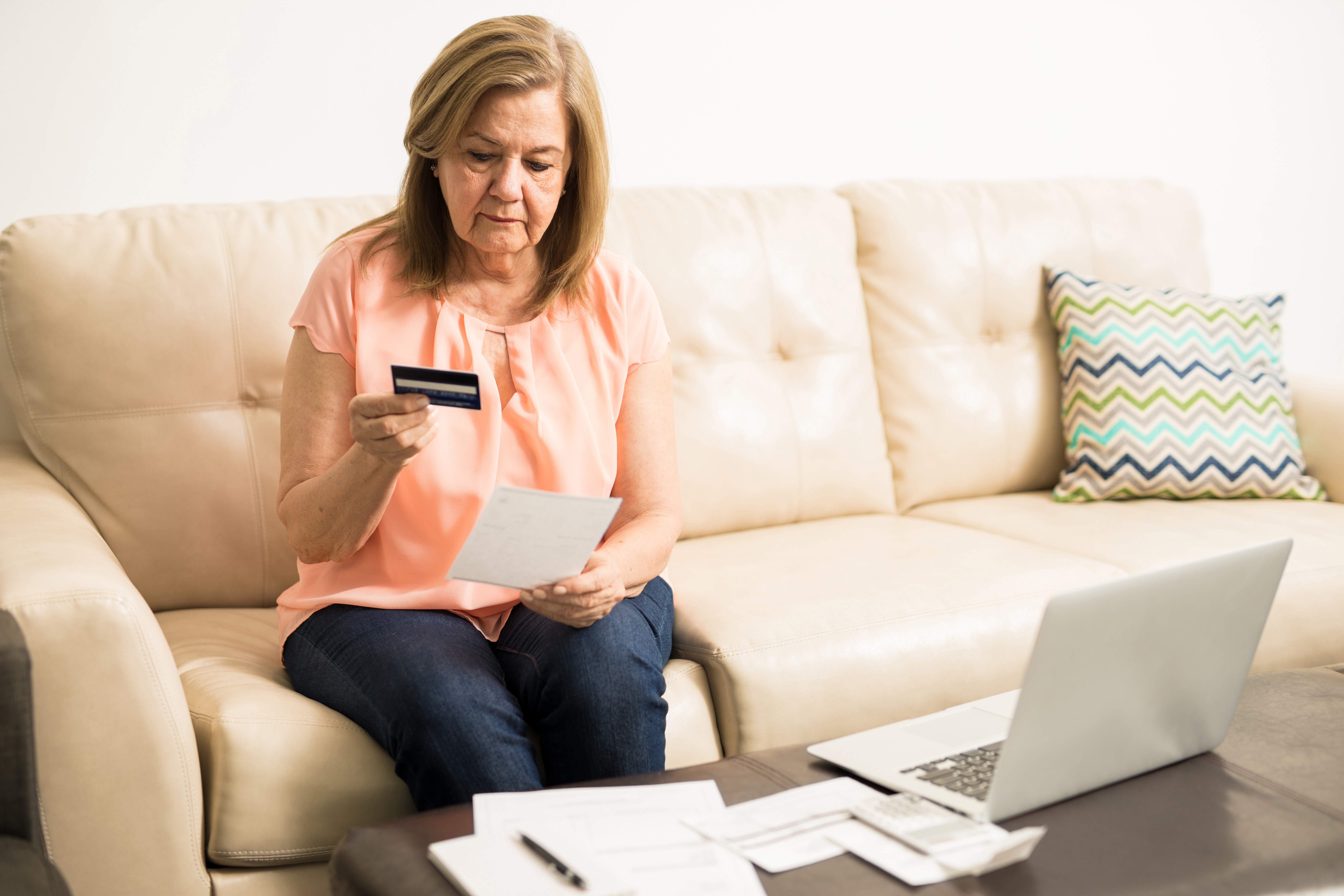 A retired woman considers her credit-card debt.