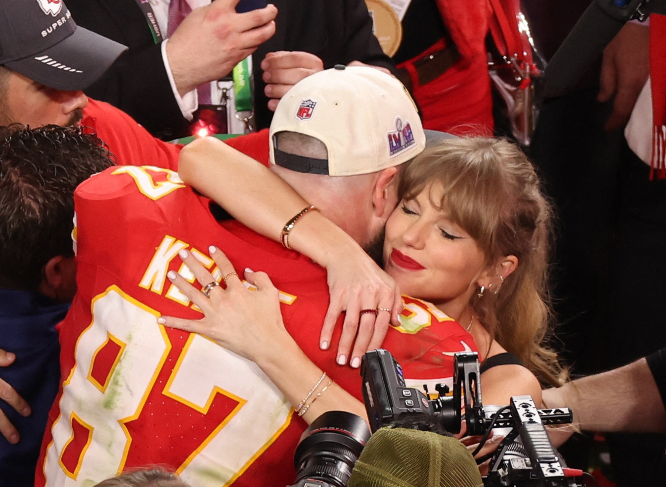 Travis Kelce celebrates with partner Taylor Swift after Kansas City Chiefs win Super Bowl LVIII. 
