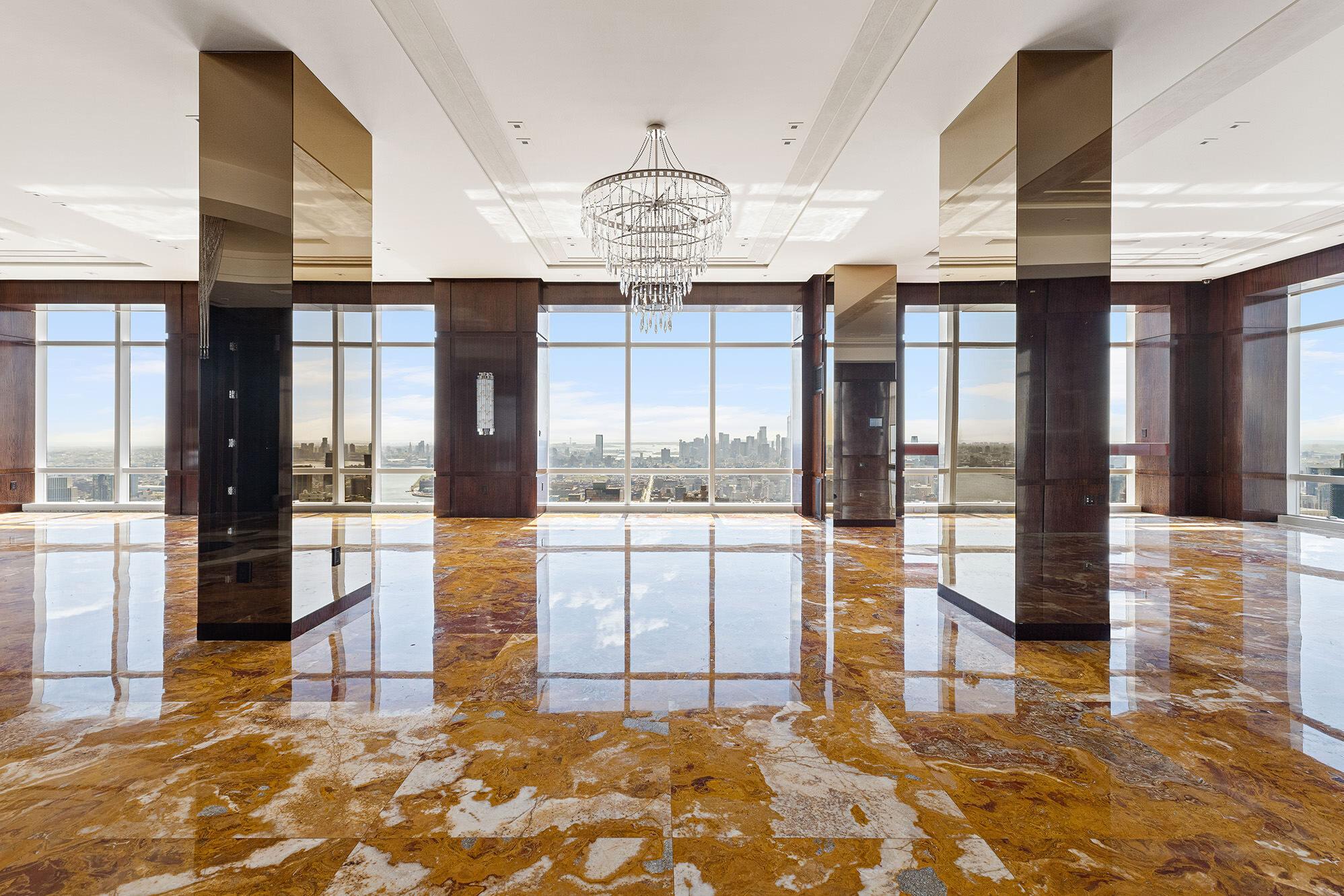 Design details include marble floors.