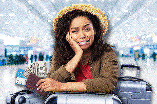 A woman holding money and passport.