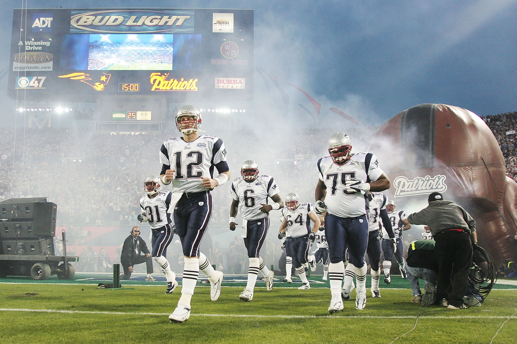 Quarterback Tom Brady #12 of the New England Patriots leads his team onto the field before the start of Super Bowl XXXIX against the Philadelphia Eagles at Alltel Stadium on February 6, 2005 in Jacksonville, Florida. 